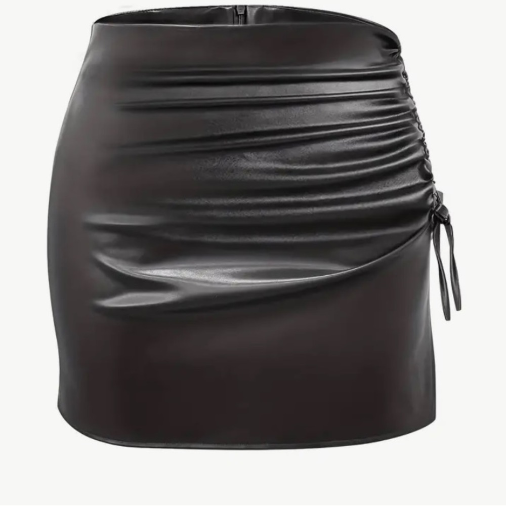 Leather skirt didn’t fit me so I’m passing it on not real leather. Fits large